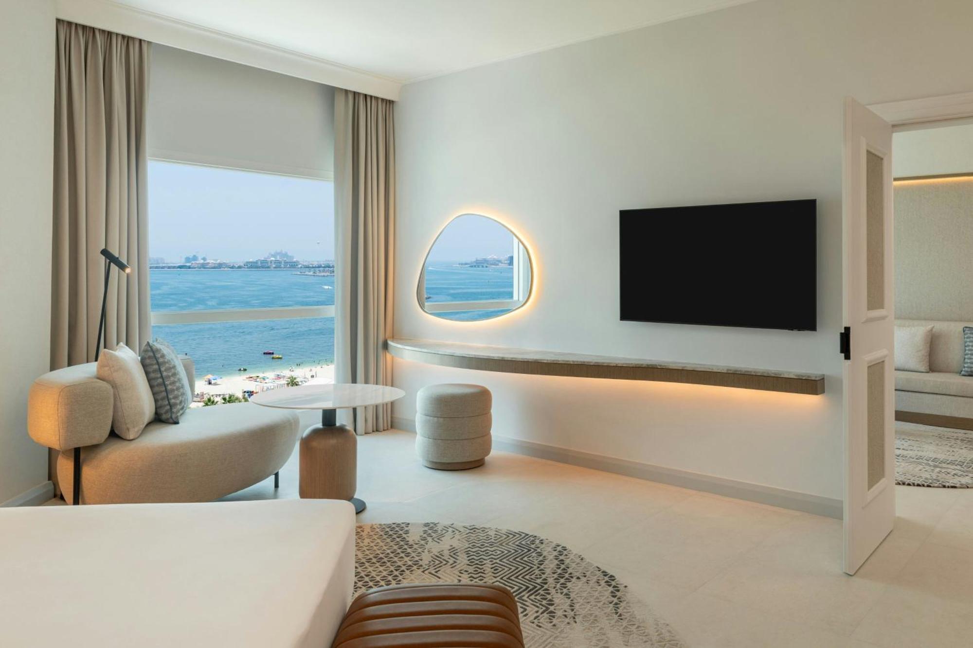 Premium Suite Sea View Including Lounge Access Afternoon Tea Evening Cocktail Hours Soft Refreshments & Canapes Private beach Access